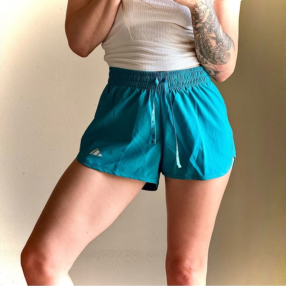 Adidas shorts, size medium, worn onceI cut the bottoms of the shorts inside